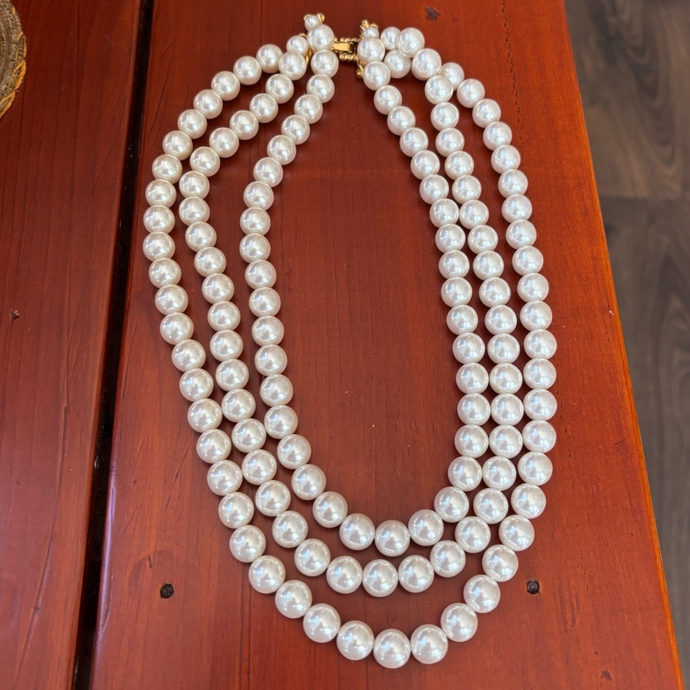 Vintage Elegant White glass triple strand Pearl Necklace with gold over clasp.